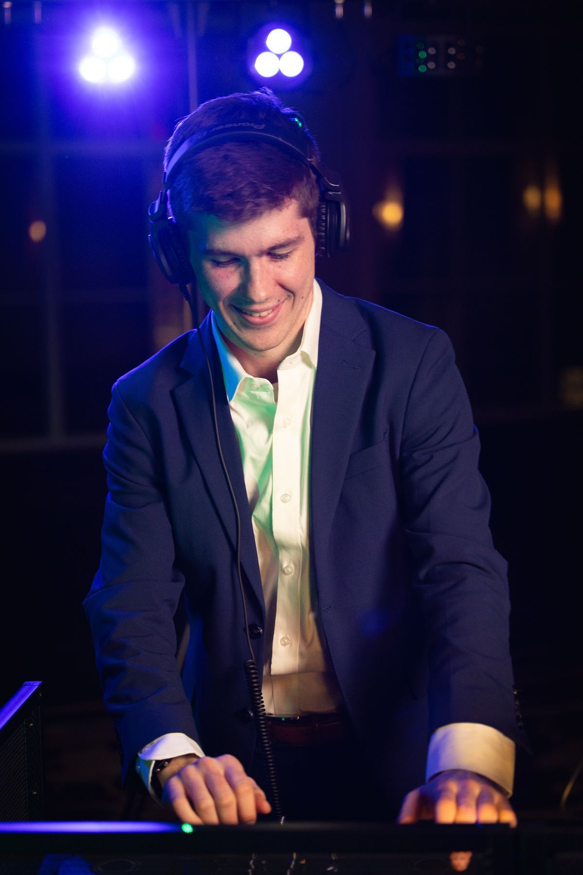 Connor O'Donohue wedding DJ smiling at Michigan reception